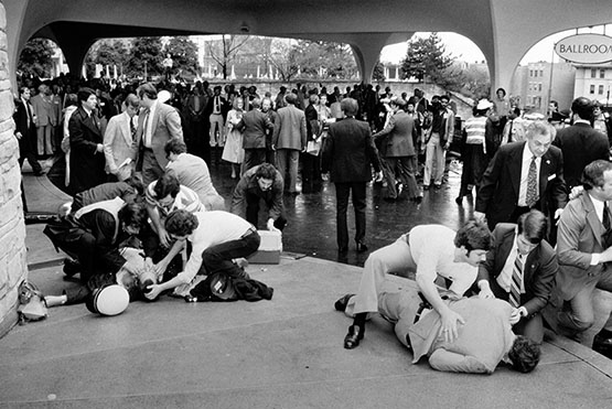 Photo of the assassination attempt on President Reagan. Dirck Halstead Photographic Archive, Dolph Briscoe Center for American History.